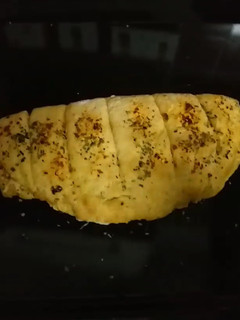 A picture of Dominoes style garlic bread.