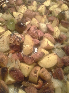 A picture of Baked sausage and potatoes.