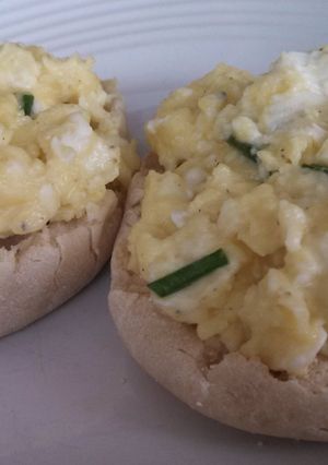 A picture of Baguette with Chevre Scrambled Eggs and Chives.
