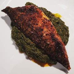 A picture of Fried Mackerel and Saag.