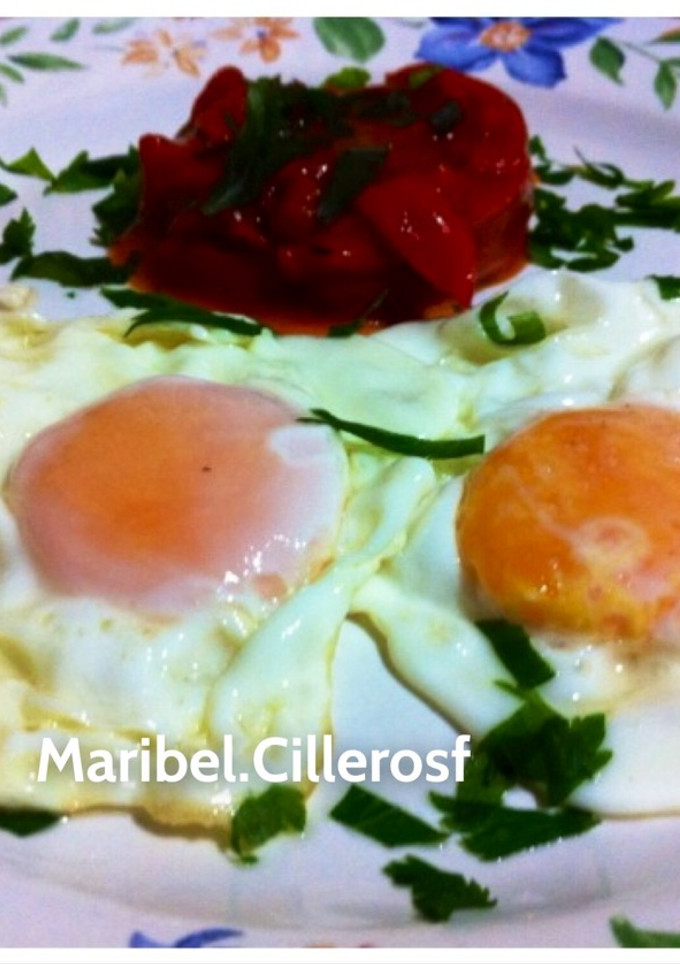 Una foto de Huevos fritos con pimientos