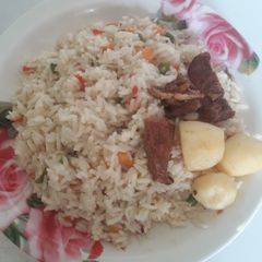 A picture of Coconut rice with Irish potatoes.