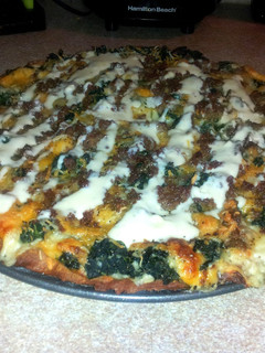 A picture of Chicken Alfredo Spinach Pizza.