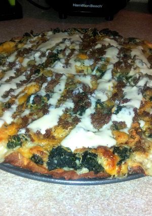 A picture of Chicken Alfredo Spinach Pizza.