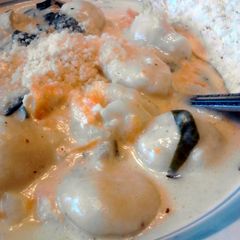 A picture of Olive Gardens Chicken & Gnocci Soup.