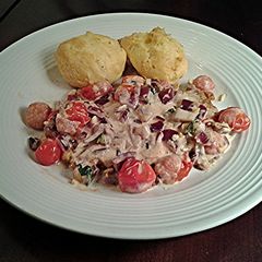 A picture of Pan Seared Chicken with Lemon and Tomatos.