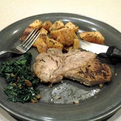 A picture of Roasted Pork Chops and Butternut Squash with Kale.