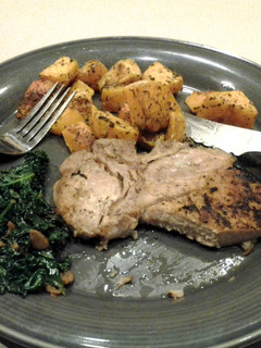 A picture of Roasted Pork Chops and Butternut Squash with Kale.