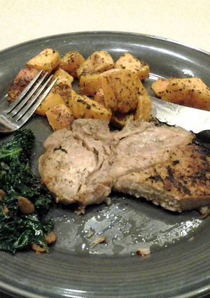 A picture of Roasted Pork Chops and Butternut Squash with Kale.