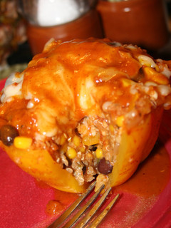 A picture of Slow Cooker Stuffed Bell Peppers with Quinoa, Black Beans, and Corn.