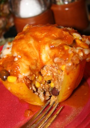A picture of Slow Cooker Stuffed Bell Peppers with Quinoa, Black Beans, and Corn.