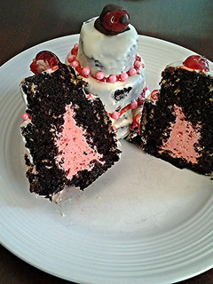 A picture of Chocolate Cakes with Cherry Cream Filling.