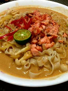 A picture of Salmon Thai Curry Noodle Soup.