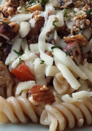 A picture of Pasta with beef mince and roasted nuts.