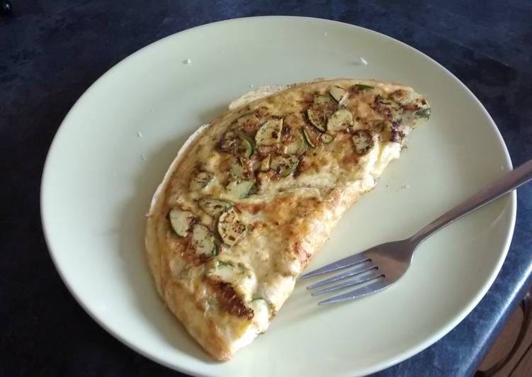 Green and cheesy omelette