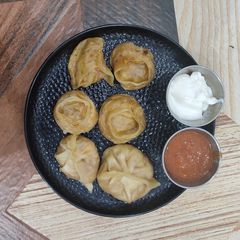 A picture of Veg Momos 📌.