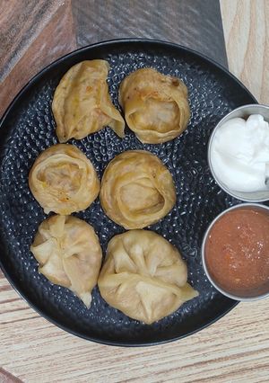 A picture of Veg Momos 📌.