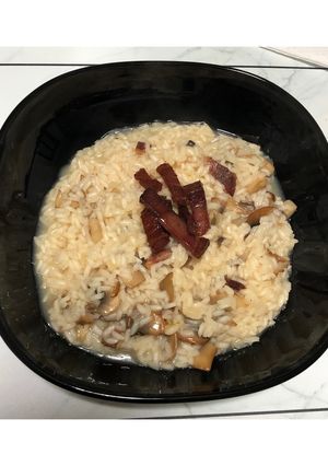 Foto di Risotto con Champignon e speck🍄‍🟫🥓🍛