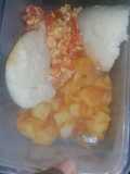 Scrambled eggs served with waru and ugali