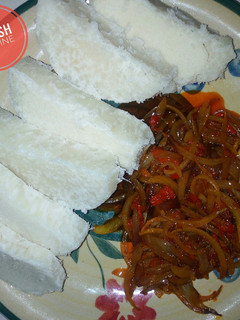 A picture of Boiled yam and onion sauce.