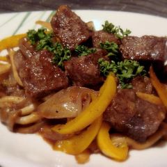 A picture of Cubed Steak with Sautéed Balsamic Vegetables.