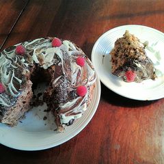 A picture of Chocolate Angel Food Cake with White and Dark Chocolate Glaze.