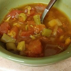 A picture of Stove top tomato and veggie soup.