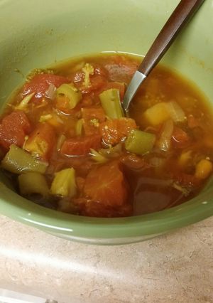 A picture of Stove top tomato and veggie soup.