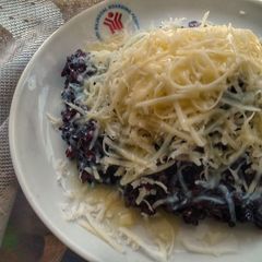 A picture of Black Sticky Rice and Cheese Dessert.
