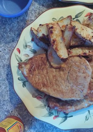 A picture of Pork butts n taters.