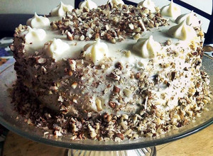 A picture of Delicious Carrot Cake with Cream Cheese Frosting!.