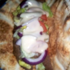 A picture of Donairs with sweet sauce.