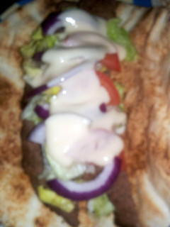 A picture of Donairs with sweet sauce.