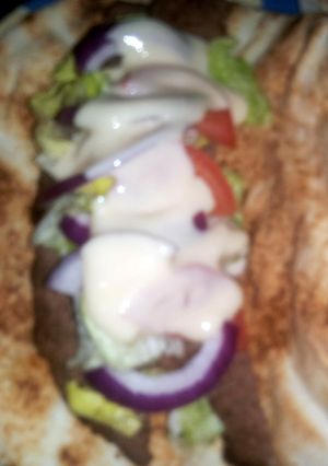 A picture of Donairs with sweet sauce.
