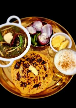 A picture of Sarson ka Saag and makki ki Roti.