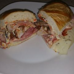 A picture of Grilled Pork Sandwich with Roasted Red Pepper Mayo "El Cumino".