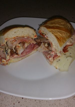 A picture of Grilled Pork Sandwich with Roasted Red Pepper Mayo "El Cumino".