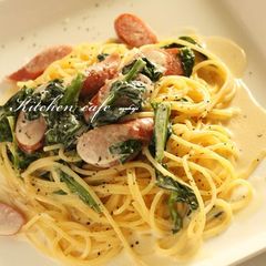 A picture of Creamy Pasta with Wiener Sausages and Spinach.
