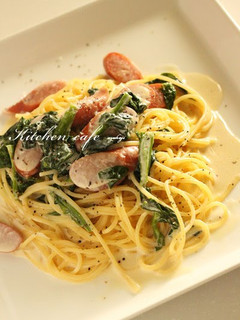 A picture of Creamy Pasta with Wiener Sausages and Spinach.