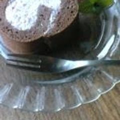 A picture of Chocolate Roll Cake with Pink Raspberry Cream.