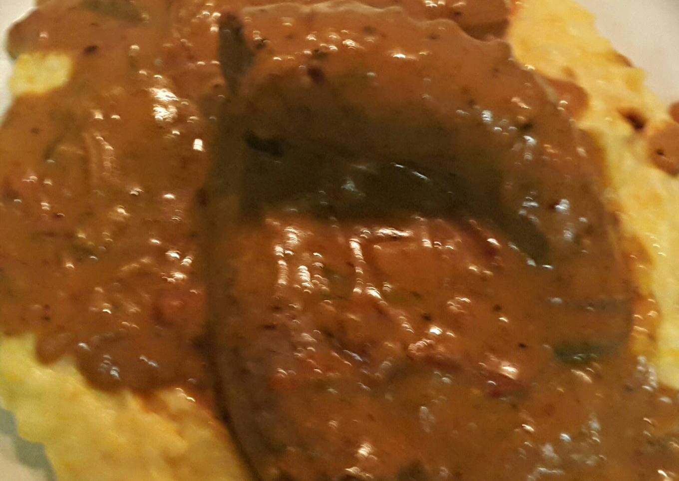 Sausage With Brown Onion Gravy.