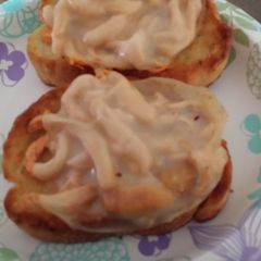 A picture of Open Face Buffalo Chicken Melts.