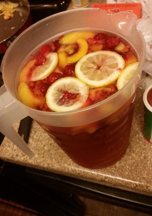 A picture of Passion Fruit Tea Sangria.