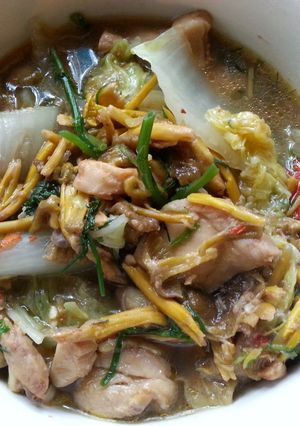 A picture of Thai chicken soup with swedish mushrooms.