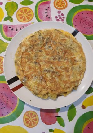 Foto principal de Tortilla con patata ajo y perejil