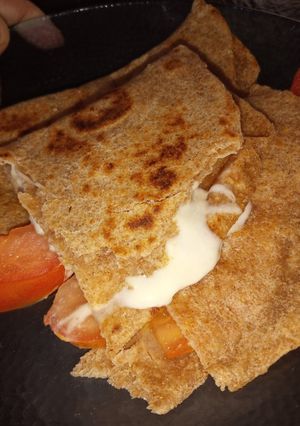 Una foto de Fajitas con tomate y queso