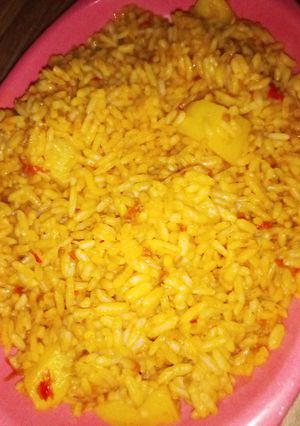 A picture of Palm Oil Jollof Rice.