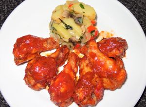 Una foto de Trutros de alas de pollo con salsa de bbq