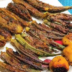 A picture of Stuffed ladyfingers,bitter gourd and potato.