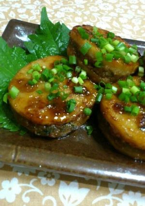 A picture of Lotus Root and Minced Meat Teriyaki with Aromatic Shiso.